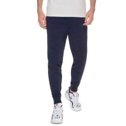 Спортивные штаны New Balance ATHLETICS VILLAGE FLEECE MP03503NGO цвет: темно-синий