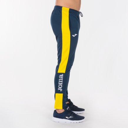 Спортивні штани Joma Champion IV 100761.309 колір: темно-синій/жовтий