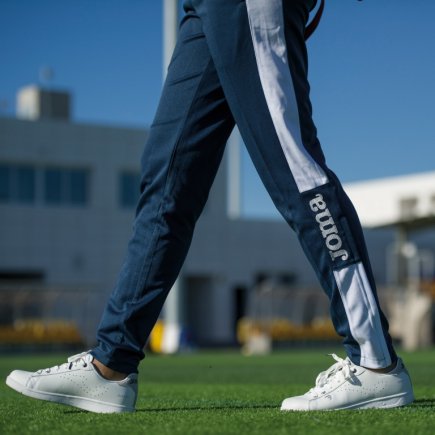 Спортивні штани жіночі Joma CHAMPION IV WOMAN 900450.302 колір: темно-синій/білий